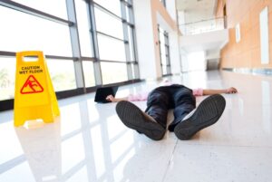 person on the floor after a slip and fall accident