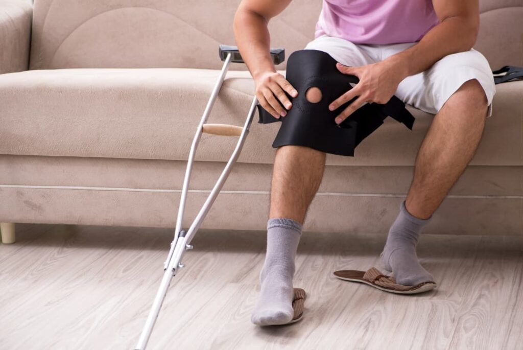 A man with a broken knee after an accident