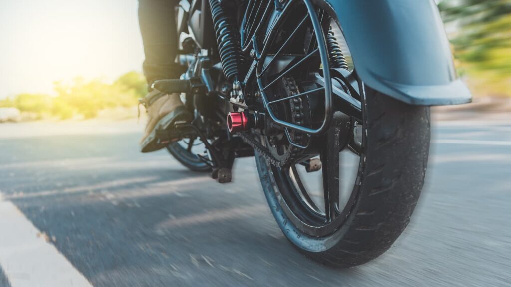 A motorcycle showing dangerously high speeds, with motion blur around the edges to emphasize the risks of excessive speed on Indianapolis roads.