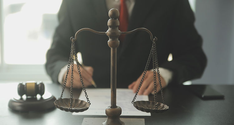 Attorneys reviewing legal documents for a South Bend pedestrian accident claim
